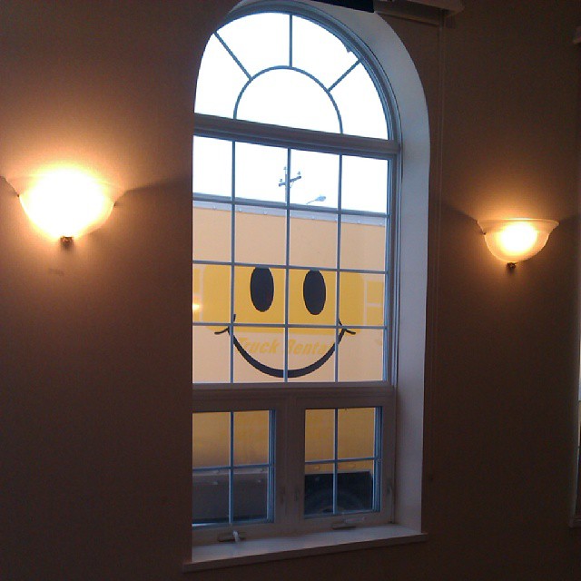 Smiley face through window